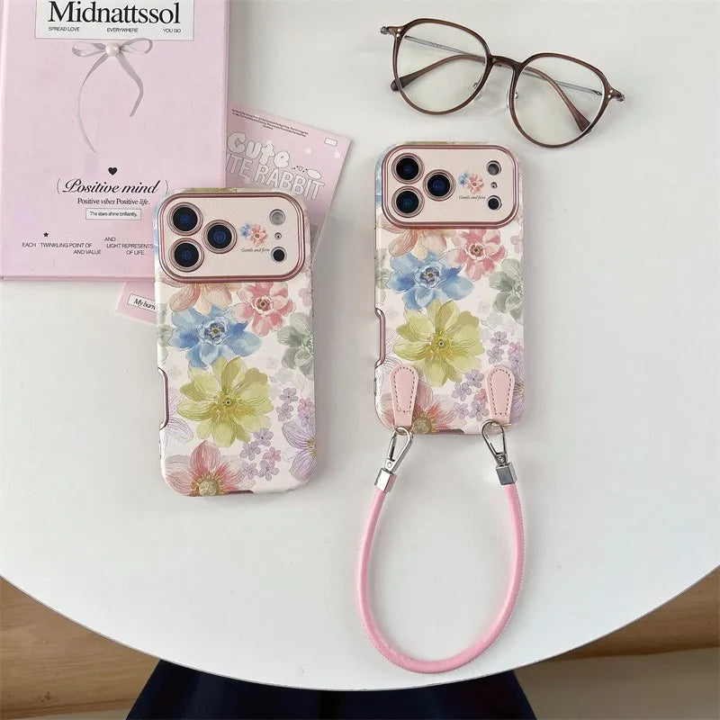 iPhone Jardim Ateliê Case with painted flowers and wrist strap